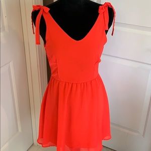 Bright pink sheer overlay with ties